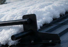 Protected metal roof with secure snow guard installation